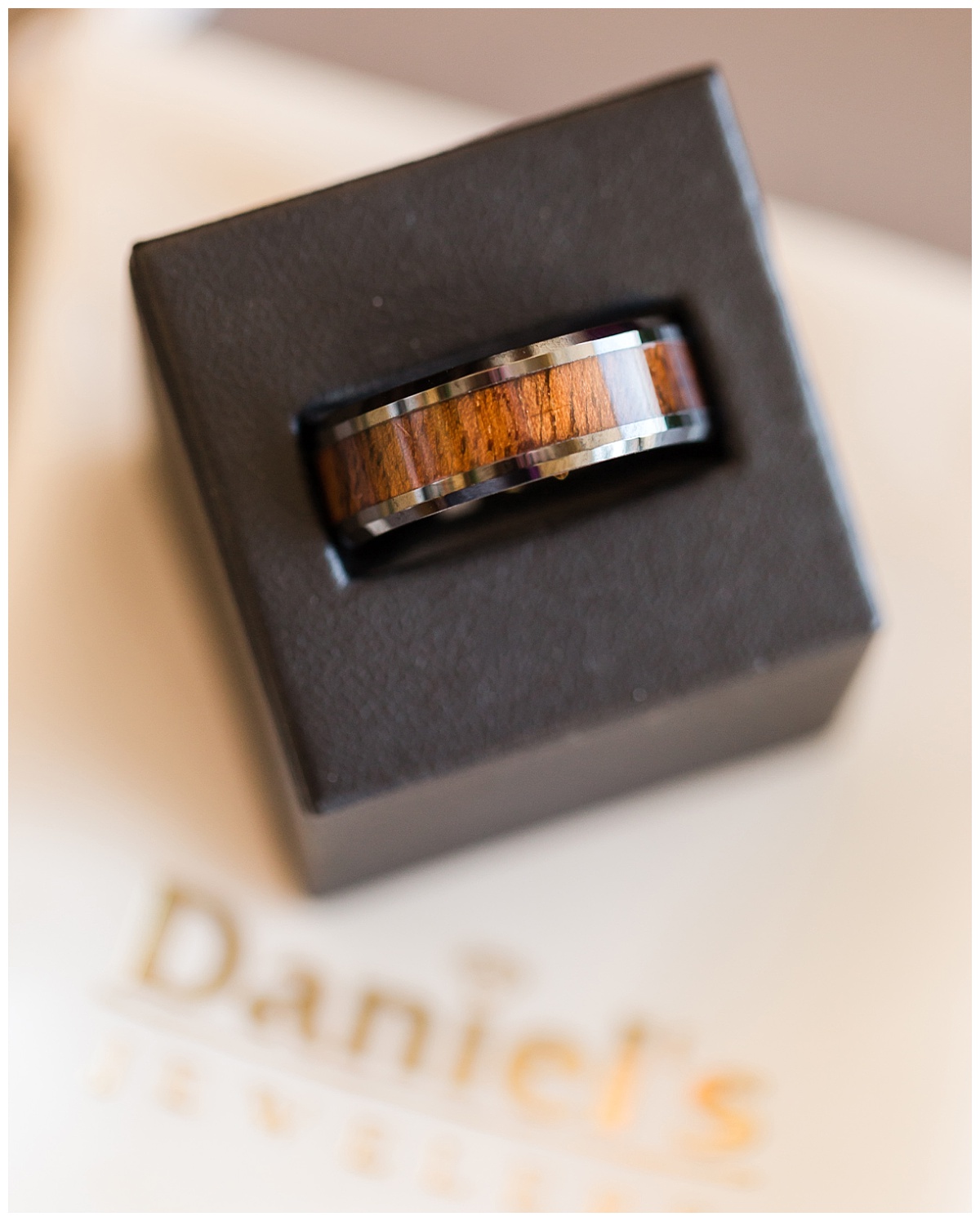 mans wedding ring with wood inlay