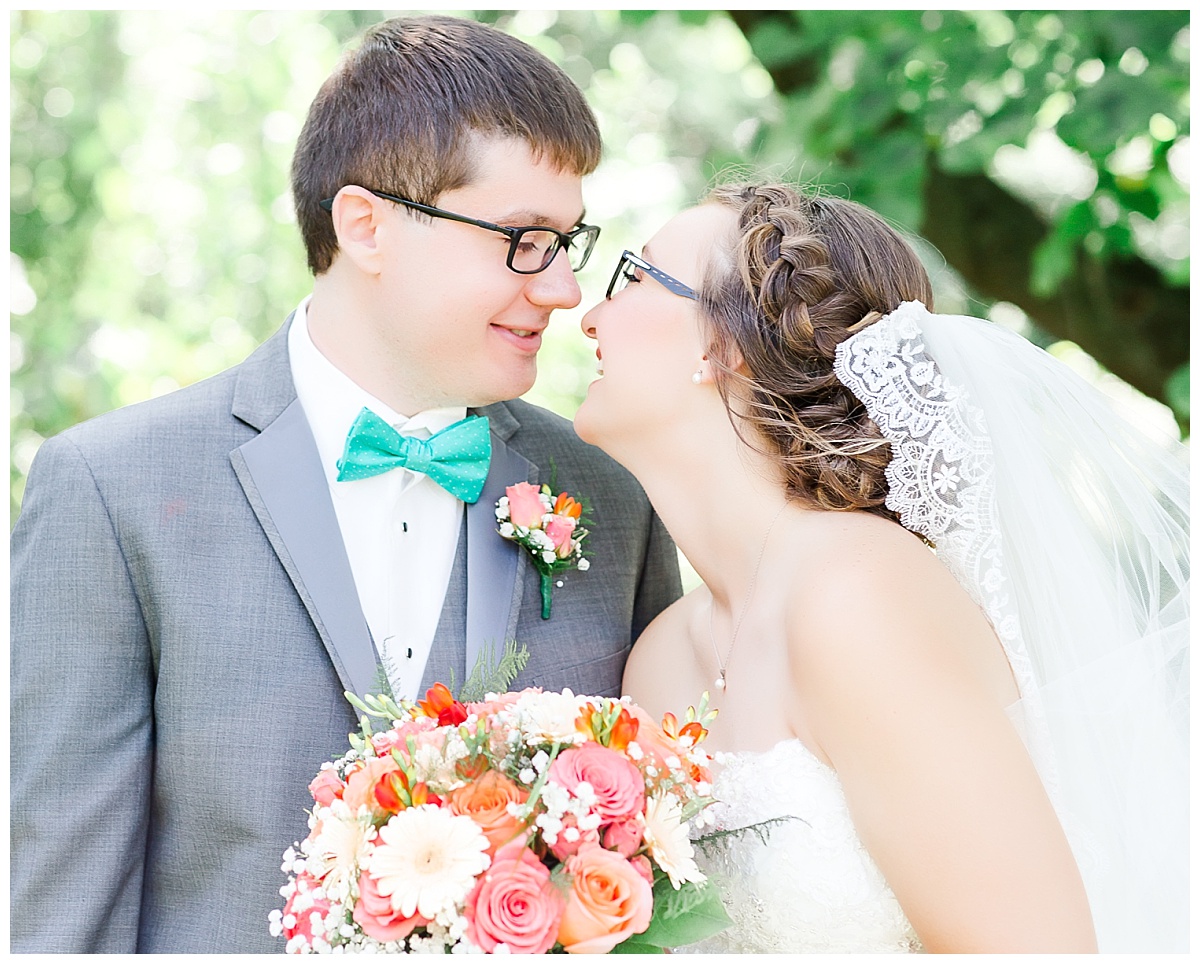 bride and groom| teal and coral wedding with gray tux