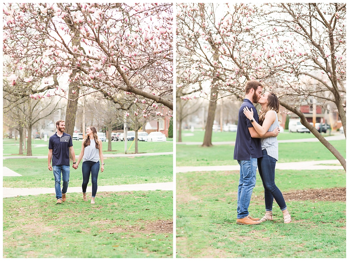 Couple standing together under tulip tree
