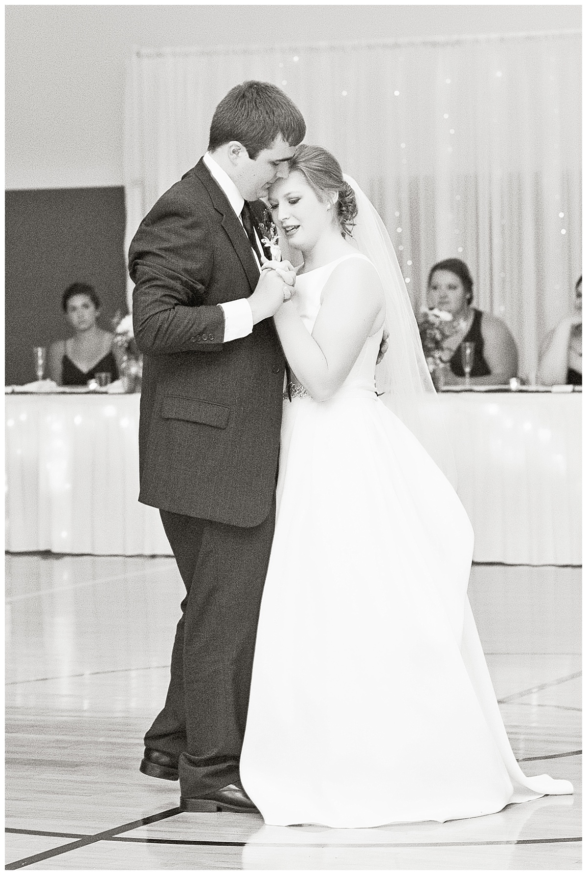 Bride and groom dancing photo by Simply Seeking Photography