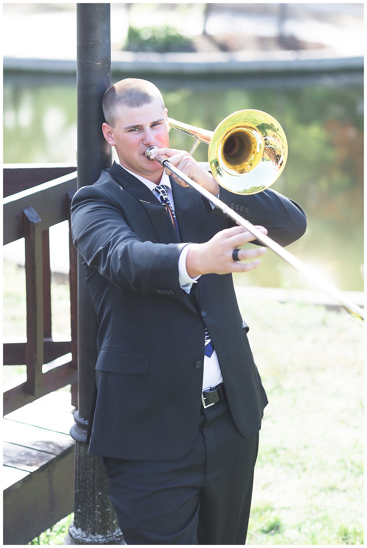 Senior guy playing trombone photo by Simply Seeking Photography