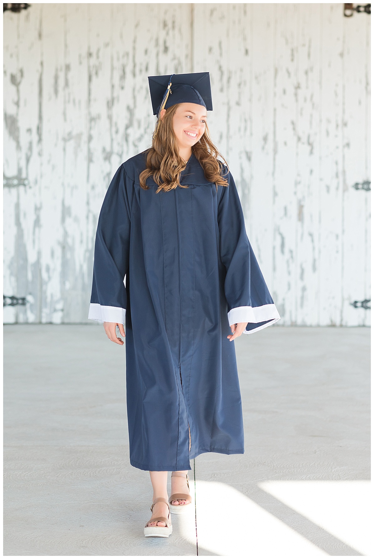 Senior Girl in cap and gown photo by Simply Seeking Photography
