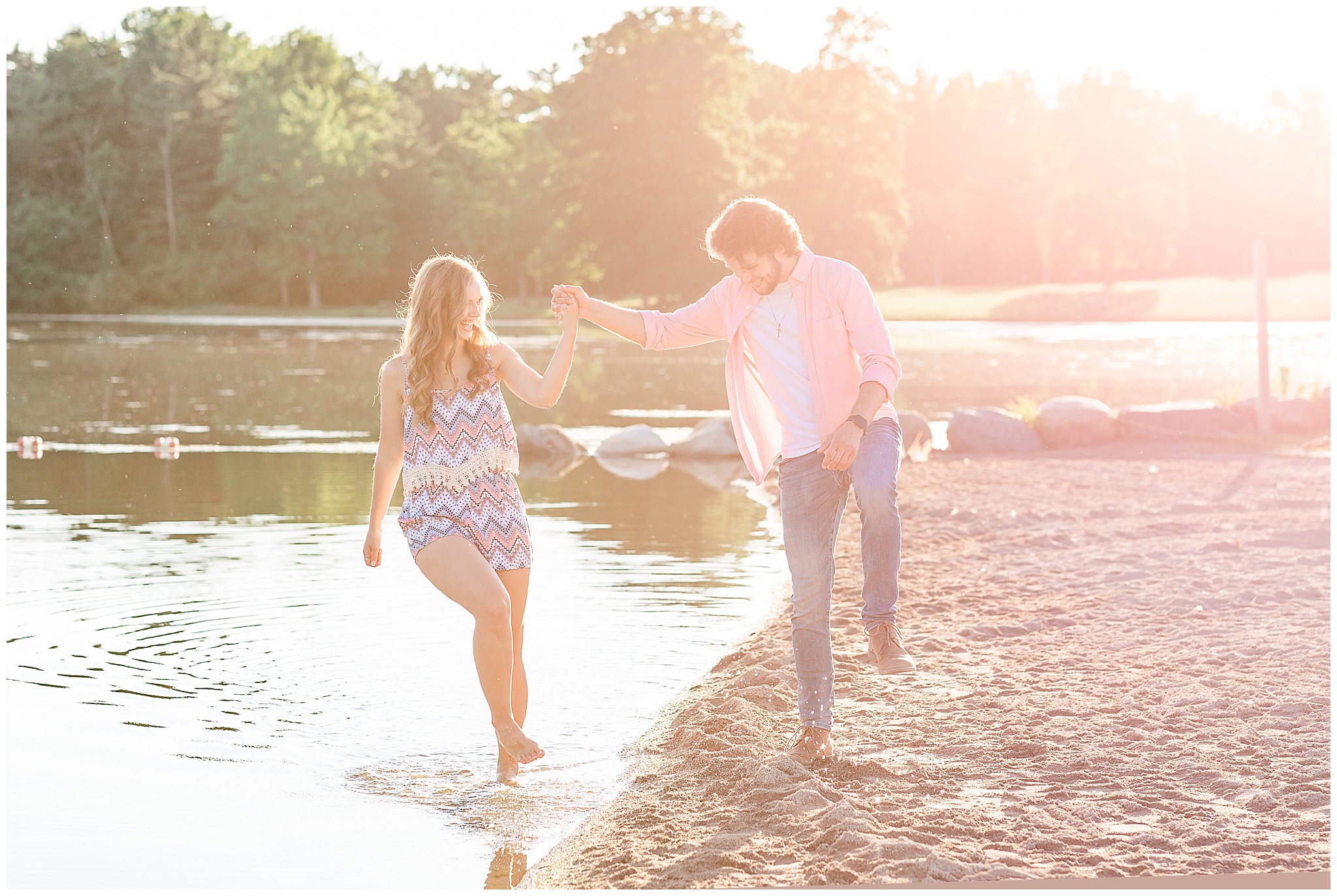 couple walking along beach during Golden Hour Summer Engagement Session