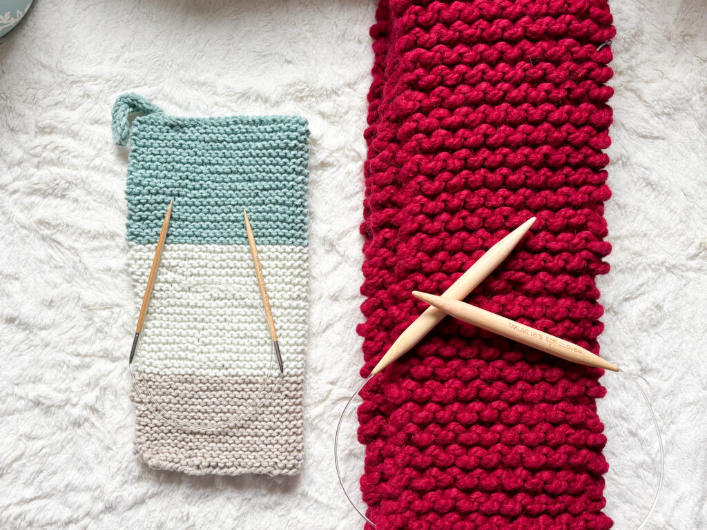 Knitting Basics Understanding Gauge. two knit pieces side by side in garter stitch one using small yarn and needles, the other using thick yarn and large needles